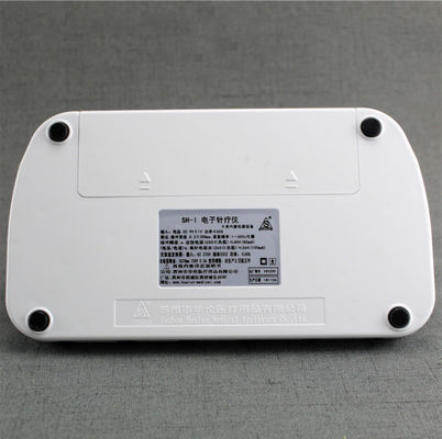 Instrumento de tratamento de acupuntura eletrônica com intensidade de saída 0-10mA, branco, frequência 1-100Hz para aplicações terapêuticas profissionais